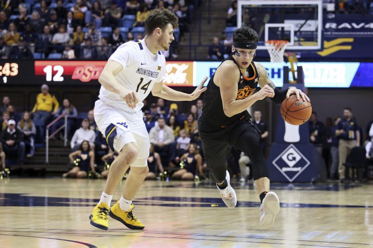Huggins Ties Smith at 879